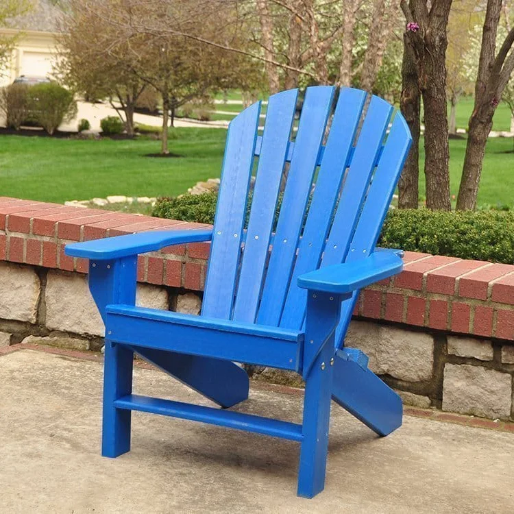 JPSAC-Scene-blue-web Blue Adirondack chair on a patio.