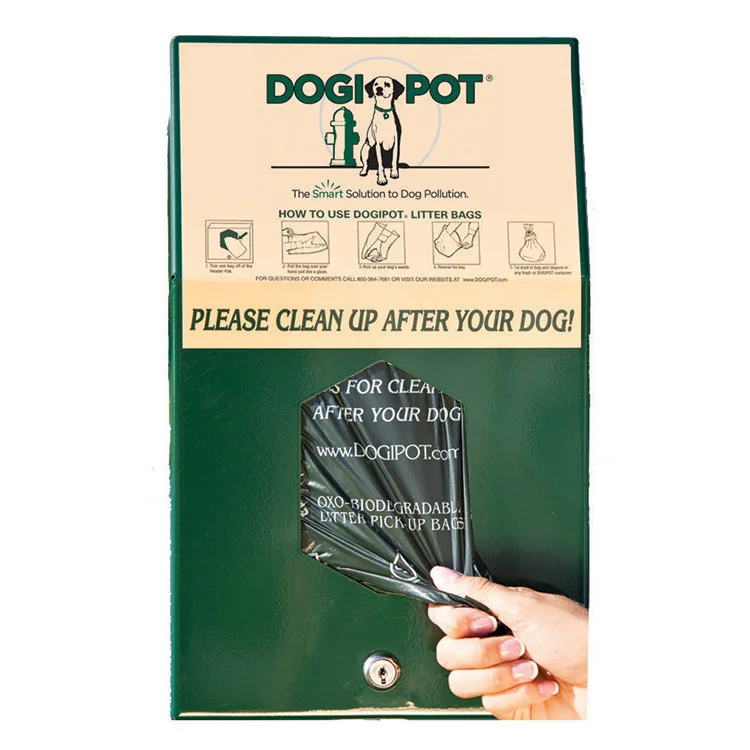KDP1003HP-Dispenser-1 Dog waste bag dispenser with instructions and a hand holding a bag.