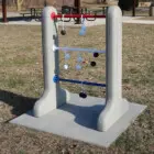 Outdoor fitness equipment in a park setting.