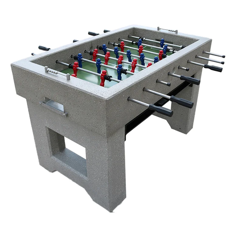 Foosball table with gray surface and red, blue, and black players.