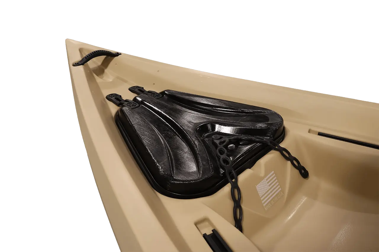 Black gun holster on beige surface.