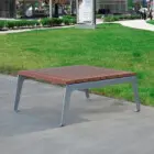 Outdoor bench on a sidewalk.
