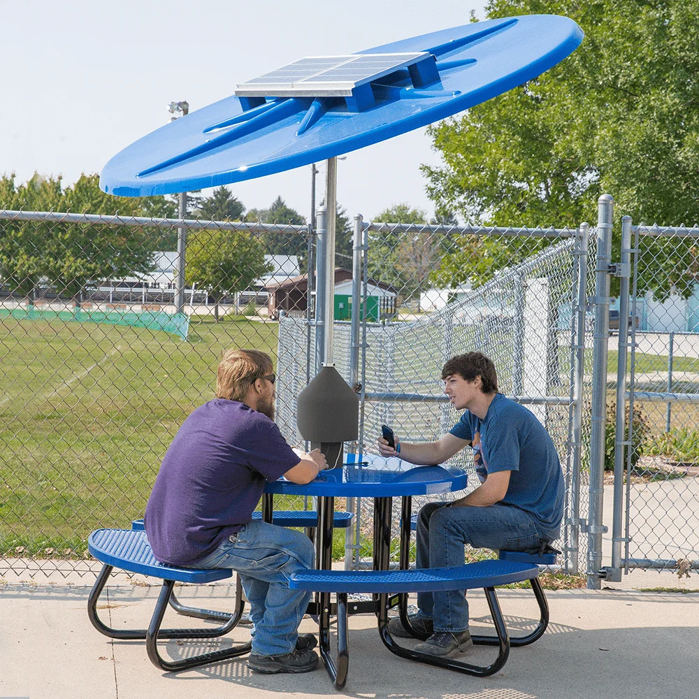 SOLARRTRFVPS006web Solar-powered picnic table with solar panel on top.