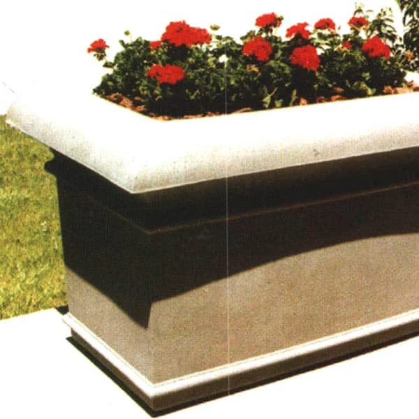 Garden planter box with red flowers.