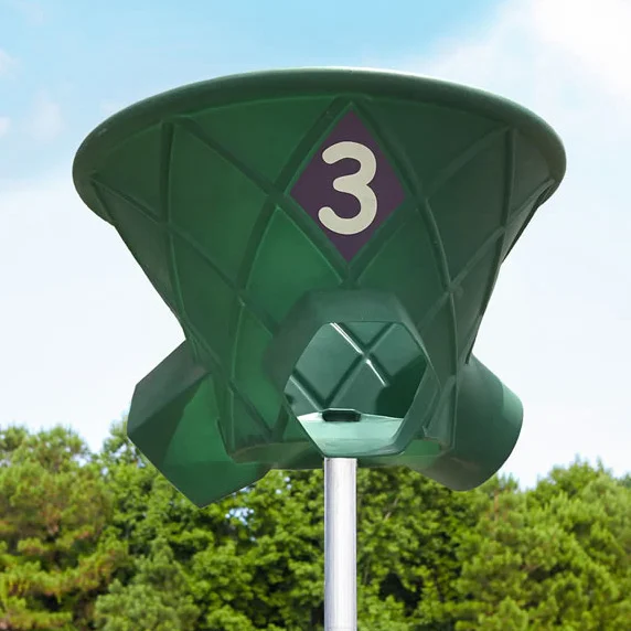 Golf tee marker with number 3 on a green background.