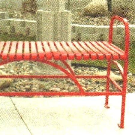 a0001191 Red metal bench on a city street.