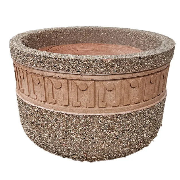 a0001317 Concrete planter with decorative band and textured surface.