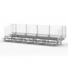 Metal bleachers with a white railing.