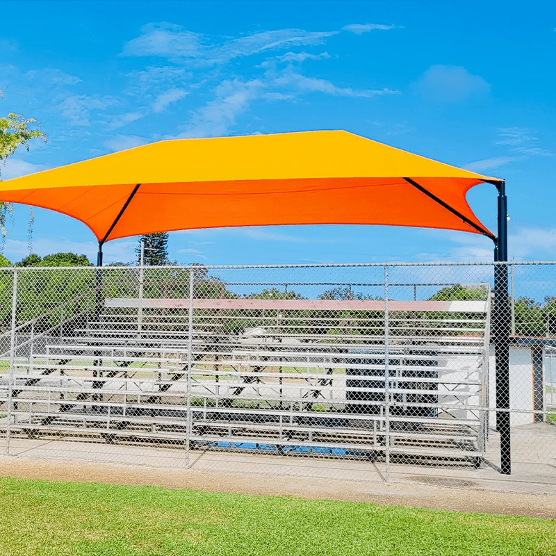 bleacher10row_ballpark_red Baseball stadium seating area with a colorful shade structure.