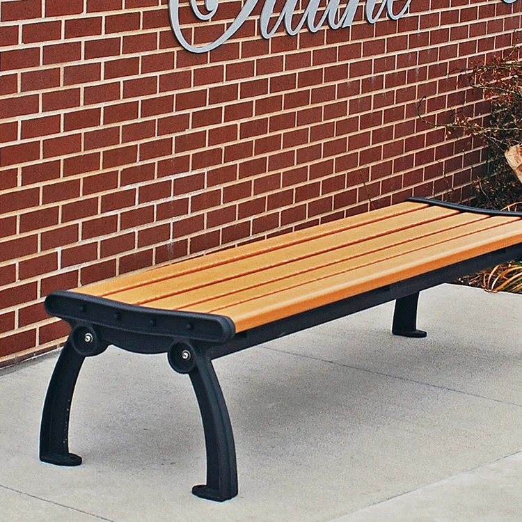 jpabl6 Outdoor bench against brick wall.