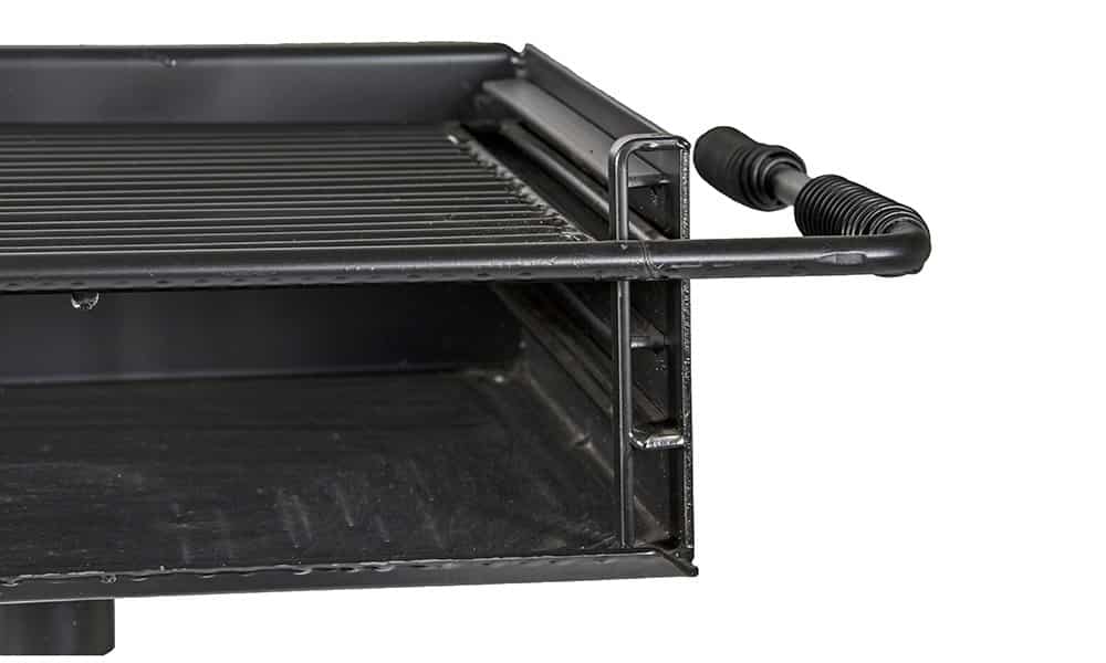 Black grill pan with handle and metal frame.