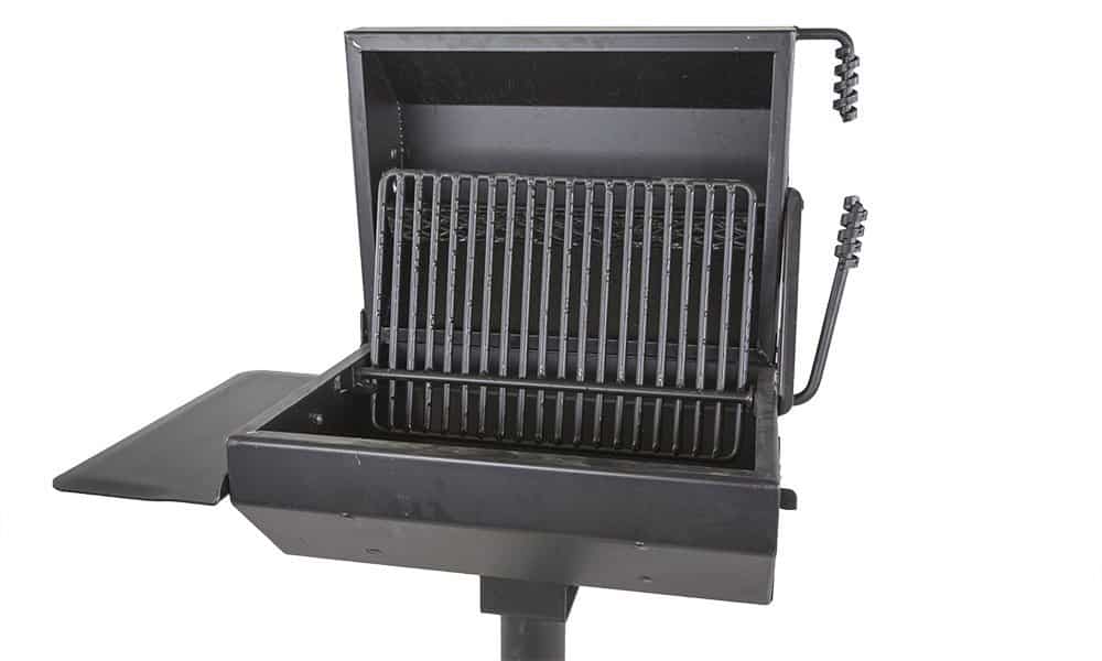 Black outdoor grill with metal grate and side handles.