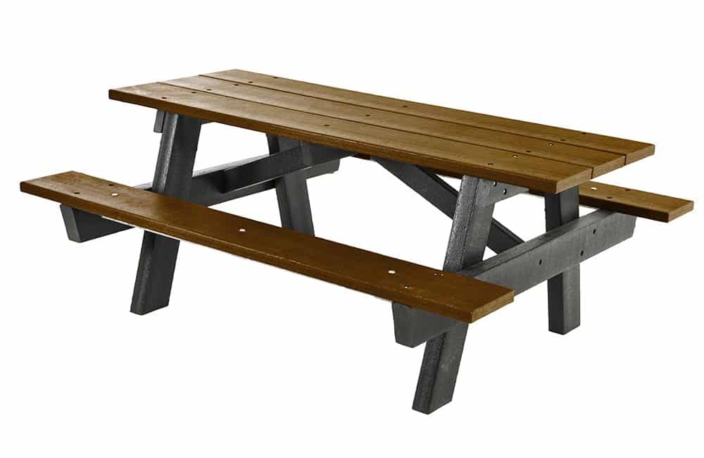 Wooden picnic table with black legs and brown slats.