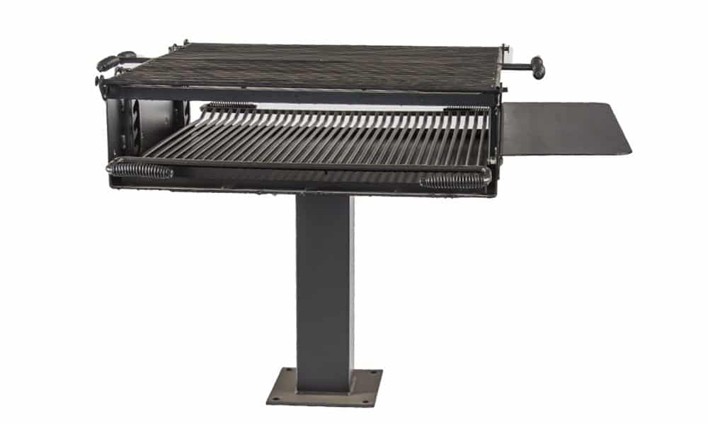Outdoor grill on a stand.