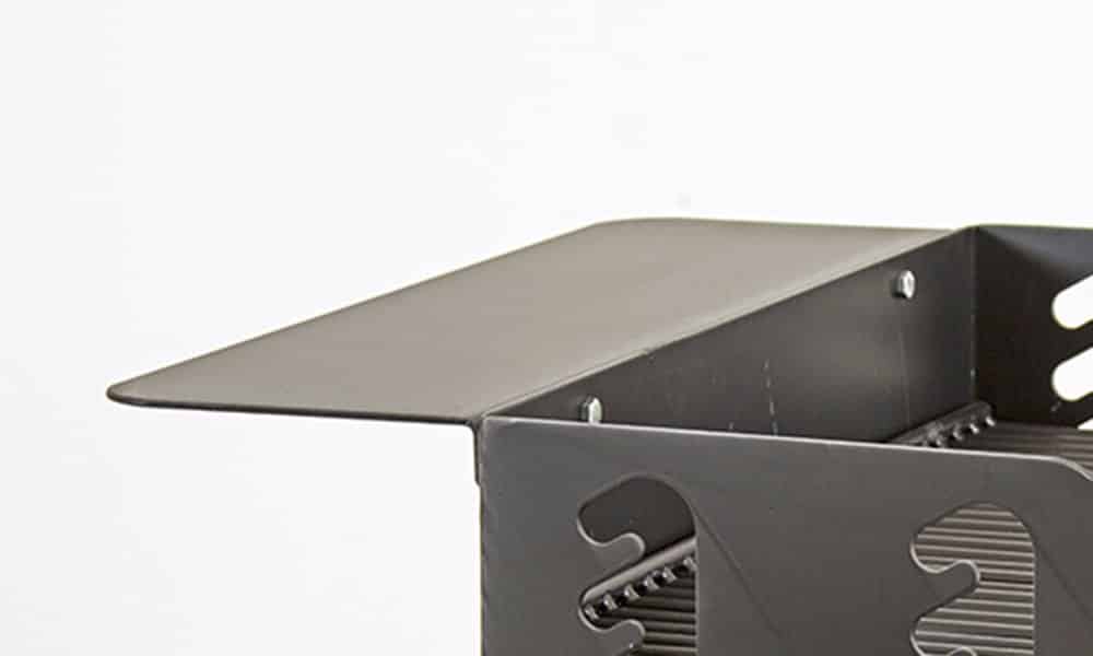 Metallic grill chimney with a sleek design.