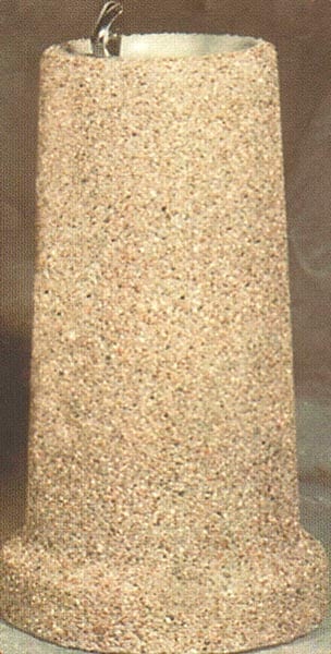 Cylindrical object with a textured surface and a hanging loop.