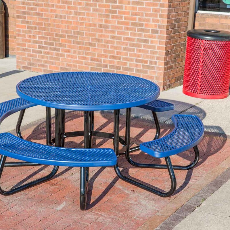 Outdoor blue round picnic table with curved bench seating.