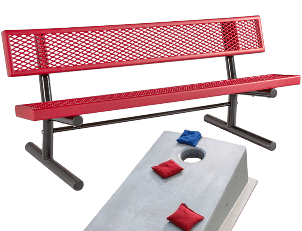 Red metal bench and bean bag toss table on green background.