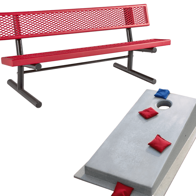 Red bench and bean bag toss game on green background.