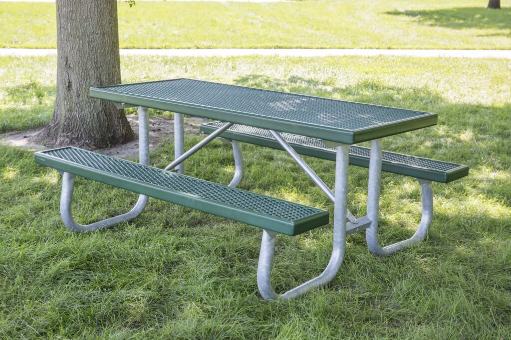 Outdoor picnic table in a park setting.