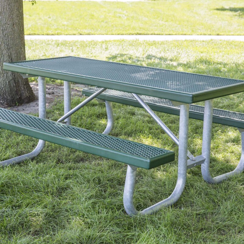 Outdoor picnic table in a park setting.