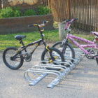 Bicycles parked in a bike rack.