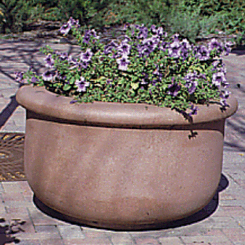 CPRR2424-CPRR4224 Large brown planter with purple flowers.