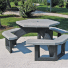 Octagonal picnic table in a park setting.