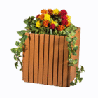 Wooden planter box with colorful flowers and green vines.